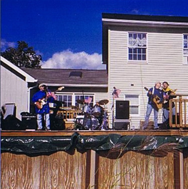 Loaded playing a rooftop deck show